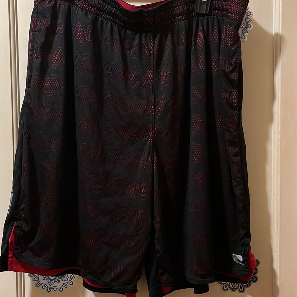 Gently loved black and red men AND1 athletic shorts. Size 2XL/2TG